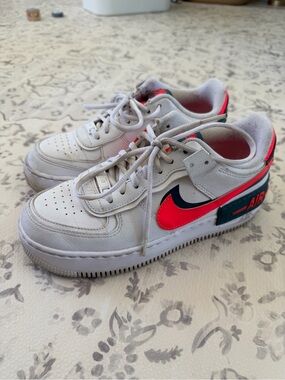Nike White Sneakers with Pink and Teal Swoosh